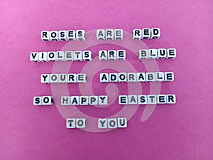 Roses are red violets are blue you're adorable so happy easter to you poster on a pink background