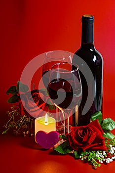 Roses, red wine, candles and hearts