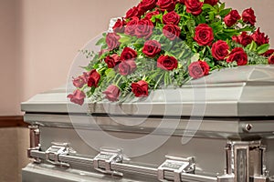 Roses on Top of Funeral Casket