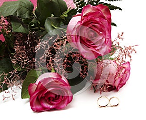 Roses and wedding rings