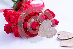 Roses and wooden hearts