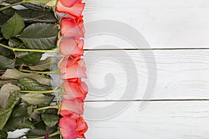 Roses on a wooden surface