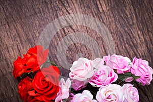 Roses on wooden table