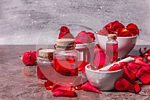 Rosewater with rose petals photo