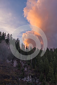 A Rosey Cloud in an Indigo Blue Sky At Sunset