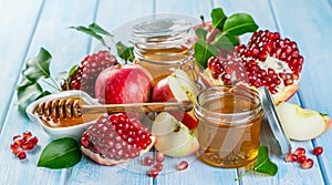 Rosh hashanah concept - honey, apples, pomegranate, symbols