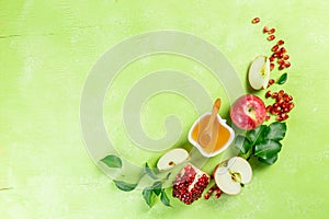 Rosh hashanah concept - honey, apples, pomegranate, symbols