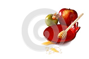 Rosh hashanah (jewesh holiday) concept - honey, apple and pomegranate isolated on white. traditional holiday symbols.