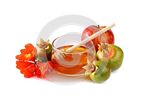 Rosh hashanah (jewesh holiday) concept - honey, apple and pomegranate isolated on white. traditional holiday symbols.