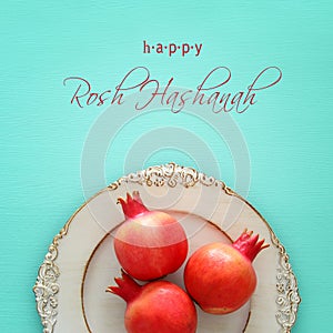 Rosh hashanah jewish New Year holiday concept. Pomegranate raditional symbol.