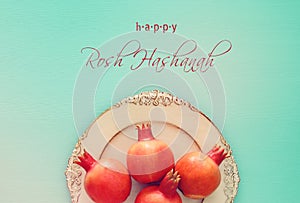 Rosh hashanah jewish New Year holiday concept. Pomegranate raditional symbol.