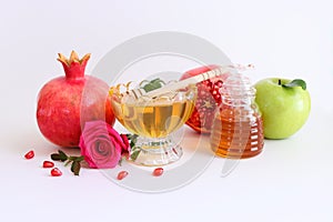 Rosh hashanah (jewish New Year holiday) concept. Traditional symbols over white background