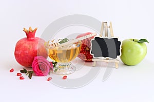 Rosh hashanah (jewish New Year holiday) concept. Traditional symbols over white background