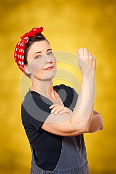 Rosie riveter woman dungarees assertiveness