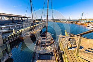 Roskilde, Denmark - May 01, 2017: Viking long boats in the harbor of Roskilde