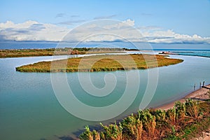 Rosolina, Veneto, Italy: landscape of the Adige river mouth in t