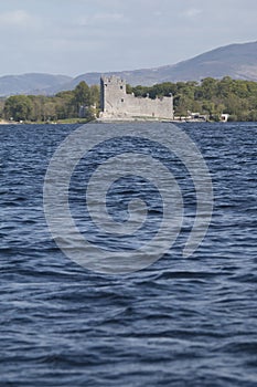Ross Castle across the water at Lough Leane, Killarney photo