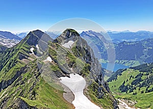 Rossalpelispitz or Rossaelplispitz and Zindlenspitz Mountains above the alpine Lake Wagitalersee Waegitalersee, Innerthal