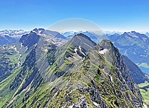 Rossalpelispitz or Rossaelplispitz and Zindlenspitz Mountains above the alpine Lake Wagitalersee Waegitalersee, Innerthal