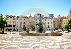 Rossio square with a fountain in Lisbon, Portugal