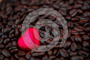 rosted coffee beans with heart chocolate photo