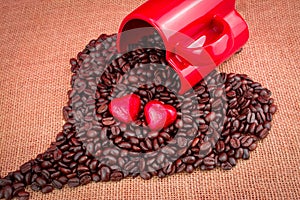 rosted coffee beans with heart chocolates red mug photo