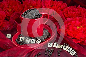 rosted coffee beans with red heart shaped mug and plate red flowers letters I LOVE Coffee