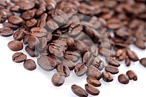 Rosted coffee grains on white backgorund