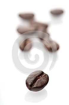 Rosted coffee grains on white backgorund