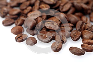 Rosted coffee grains on white backgorund