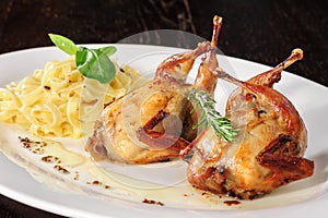 Rosted or fried quail with herbs and tagliatelle