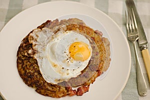 Rosti potatoes with fried egg