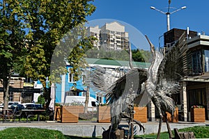 Metal statue of two dancing cranes on embankment of Rostov-on-Don