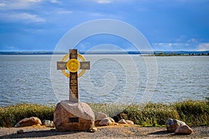 Orthodox cross on the Lake Nero shore in Rostov photo