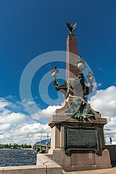 Rostral obelisk of Troitsky bridge in Saint-Petersburg, Russia.