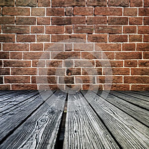 Rostrum made of wooden planks on brick wall