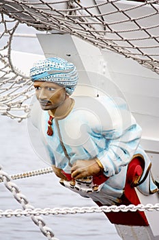 Rostrum sculpture of man on ship