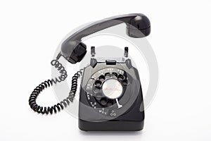 A rotary dial telephone