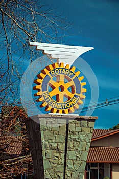 Rotary International logo sculpture on pedestal