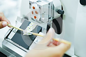 Rotary Microtome Section for diagnosis in pathology make microscope slide histology.