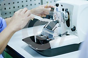 Rotary Microtome Section for diagnosis in pathology make microscope slide histology.