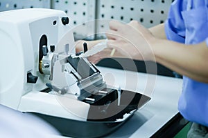 Rotary Microtome Section for diagnosis in pathology make microscope slide histology.