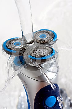 Rotary Shaver rinsed with Water