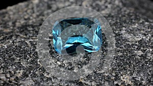 Rotate faceted blue jewelry gemstone aquamarine