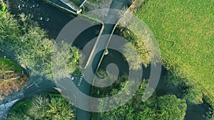 Rotating aerial view of a bridge, countryside