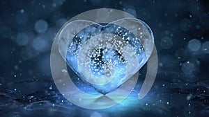 Rotating blue ice glass heart with snowflakes inside motion background loop 4 k