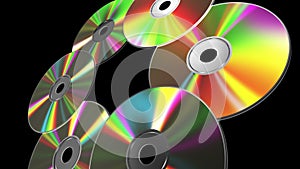 Rotating CD-DVD Discs Over Metal Background. 4K. 3840x2160. Seamless Looped. Alpha Channel.