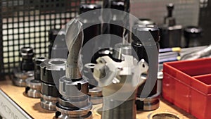 Rotating head bits and tools in a high precision mechanics lathe in workshop