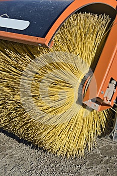 Rotating industrial brush of a street cleaning tractor