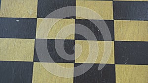Rotating old wooden empty chessboard video background